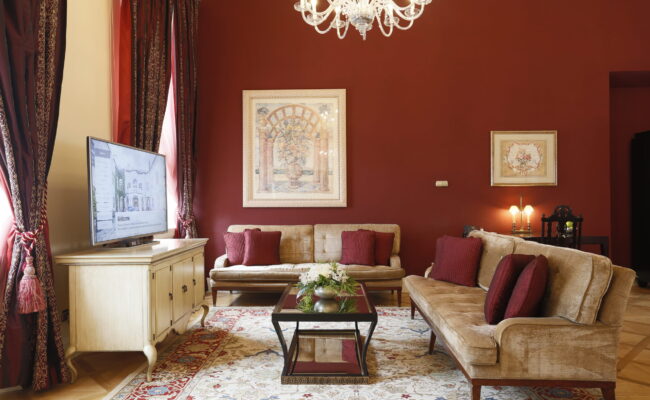 Royal palace suite living room with television